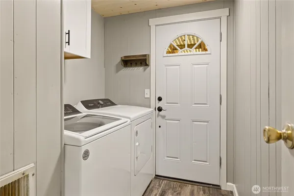 a utility room with dryer and washer