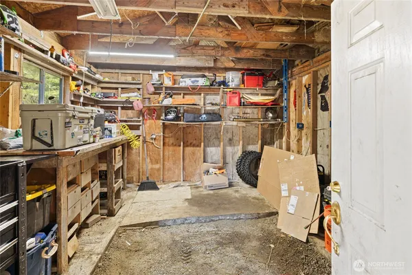 a balcony with wooden floor and fence