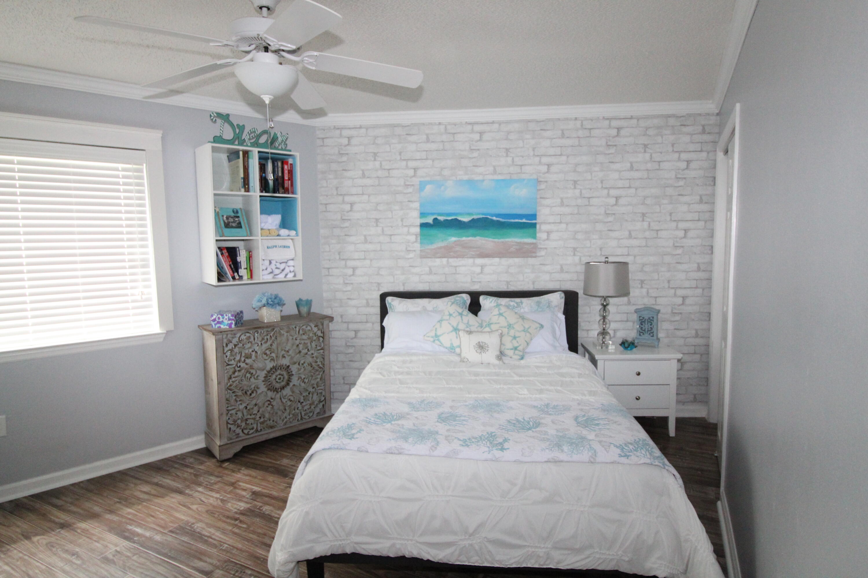 285 Payne Street, Unit 19B Miramar Beach, FL 32550 - Photo 12 of 24 a living room with furniture and a window