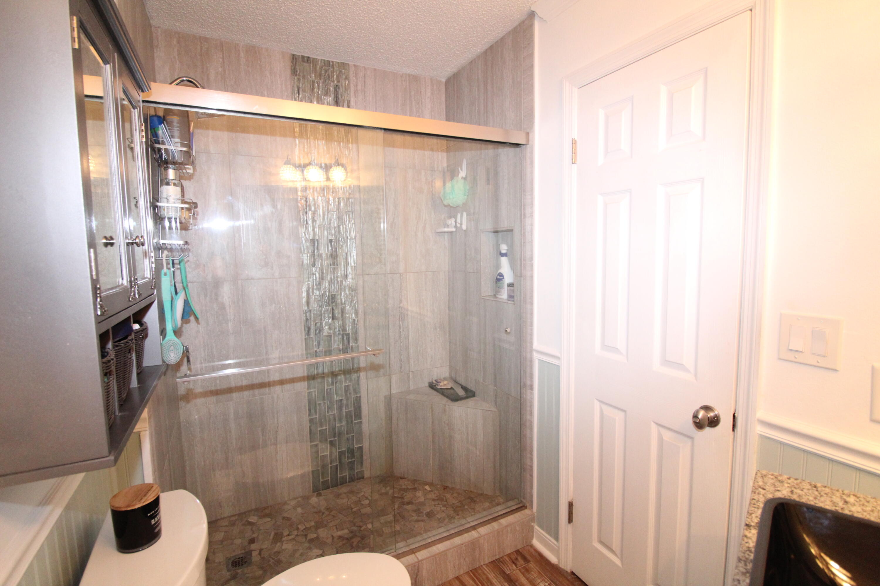285 Payne Street, Unit 19B Miramar Beach, FL 32550 - Photo 10 of 24 a bathroom with a shower and a toilet