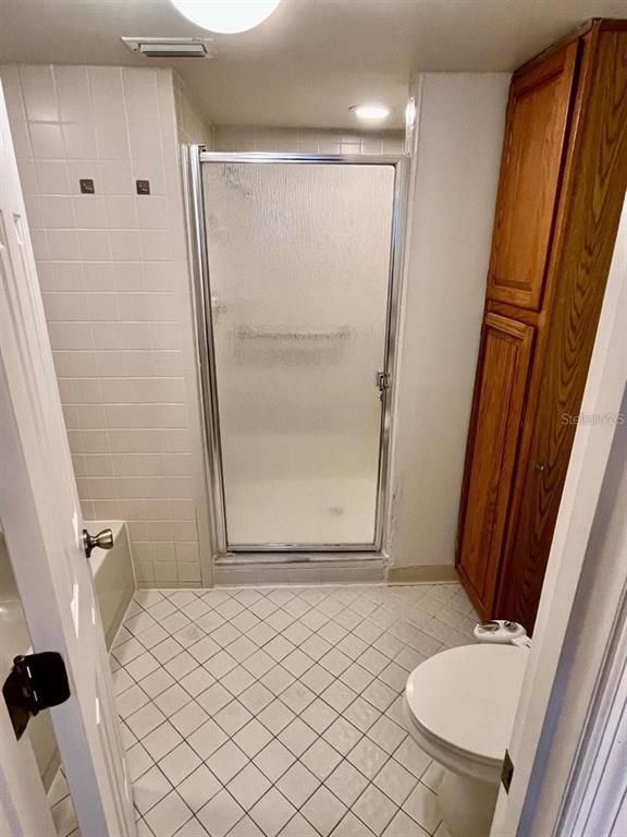 7608 Spring Bay Cove, Unit S Orlando, FL 32819 - Photo 15 of 20 a bathroom with a sink and a mirror