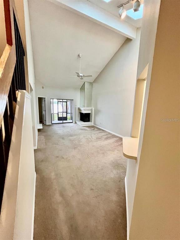 7608 Spring Bay Cove, Unit S Orlando, FL 32819 - Photo 2 of 20 a view of a big room with closet and windows