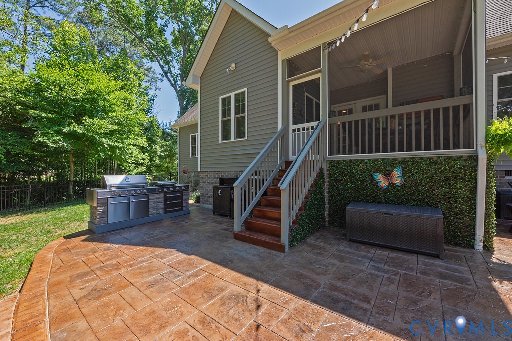 6446 Chestnut Church Road Mechanicsville, VA 23116 - Photo 39 of 49 Exterior patio featuring stamped concrete flooring