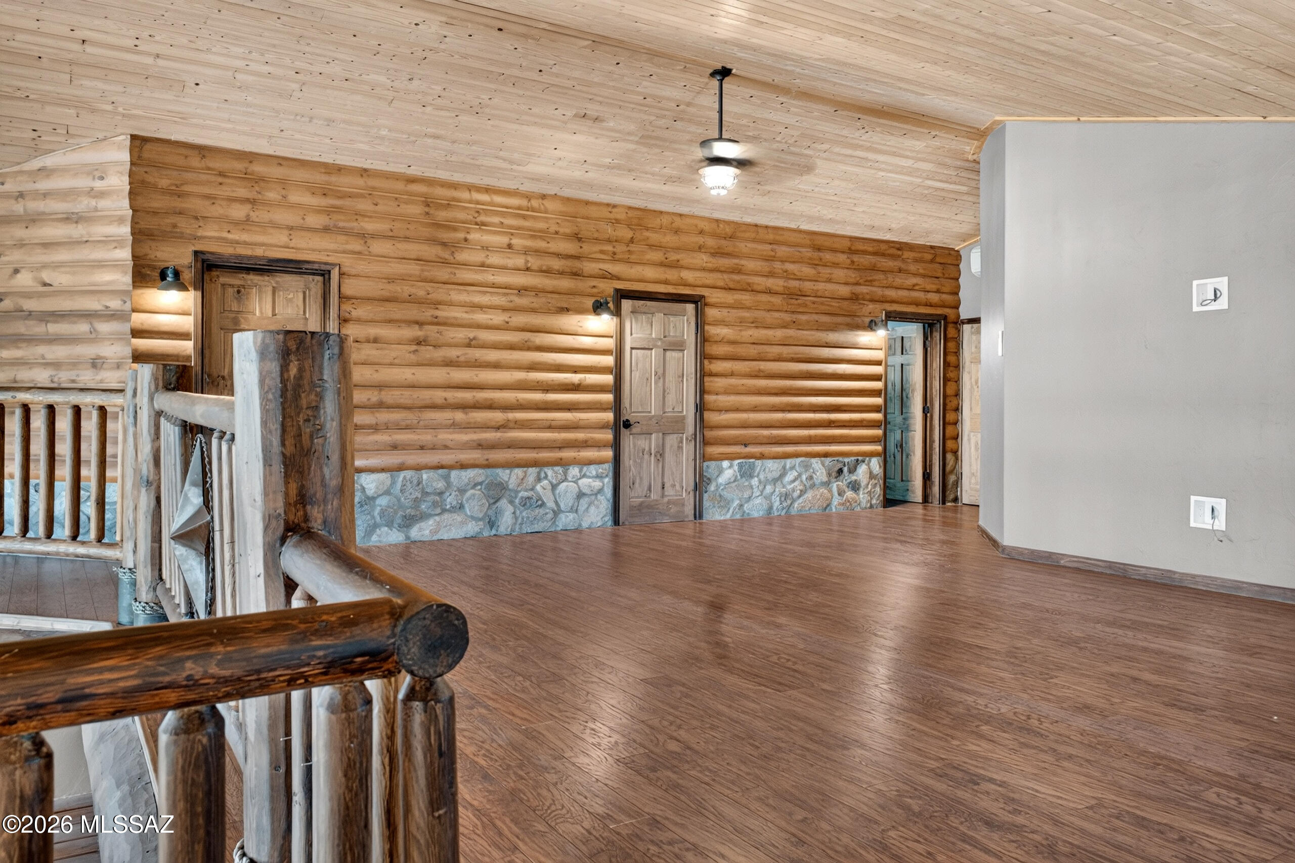 531 South Cody Loop Road Oracle, AZ 85623 - Photo 18 of 38 a view of stairs and wooden floor