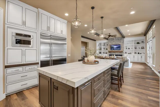 a bathroom with a sink double vanity and a mirror