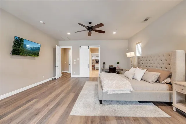 a kitchen with granite countertop a sink and cabinets