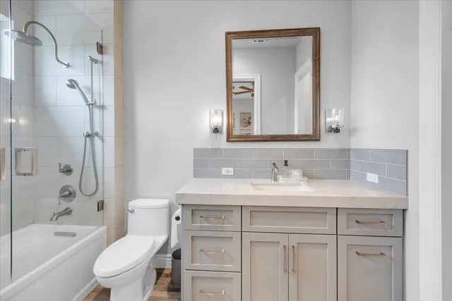 an aerial view of a house with swimming pool garden and patio