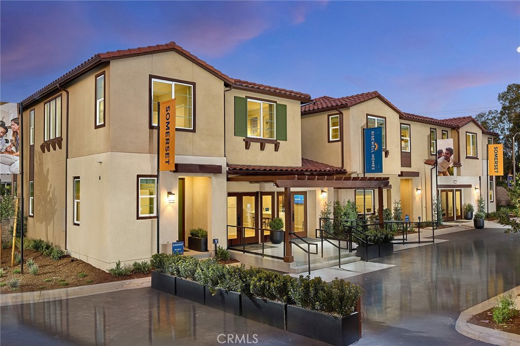 12706 Rosemount Road Eastvale, CA 92880 - Photo 1 of 25 a front view of a house with lake view and trees