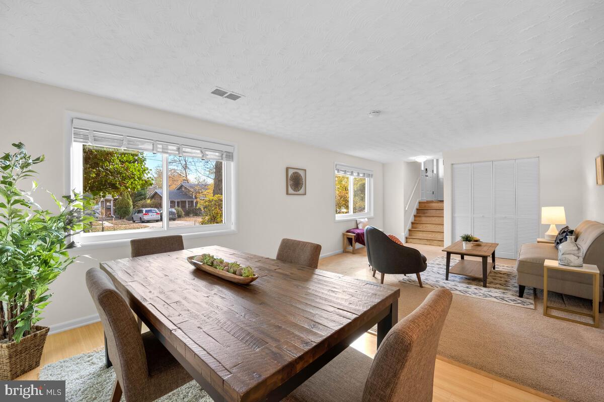 413 Waterford Road Silver Spring, MD 20901 - Photo 18 of 48 a living room with furniture and a large window