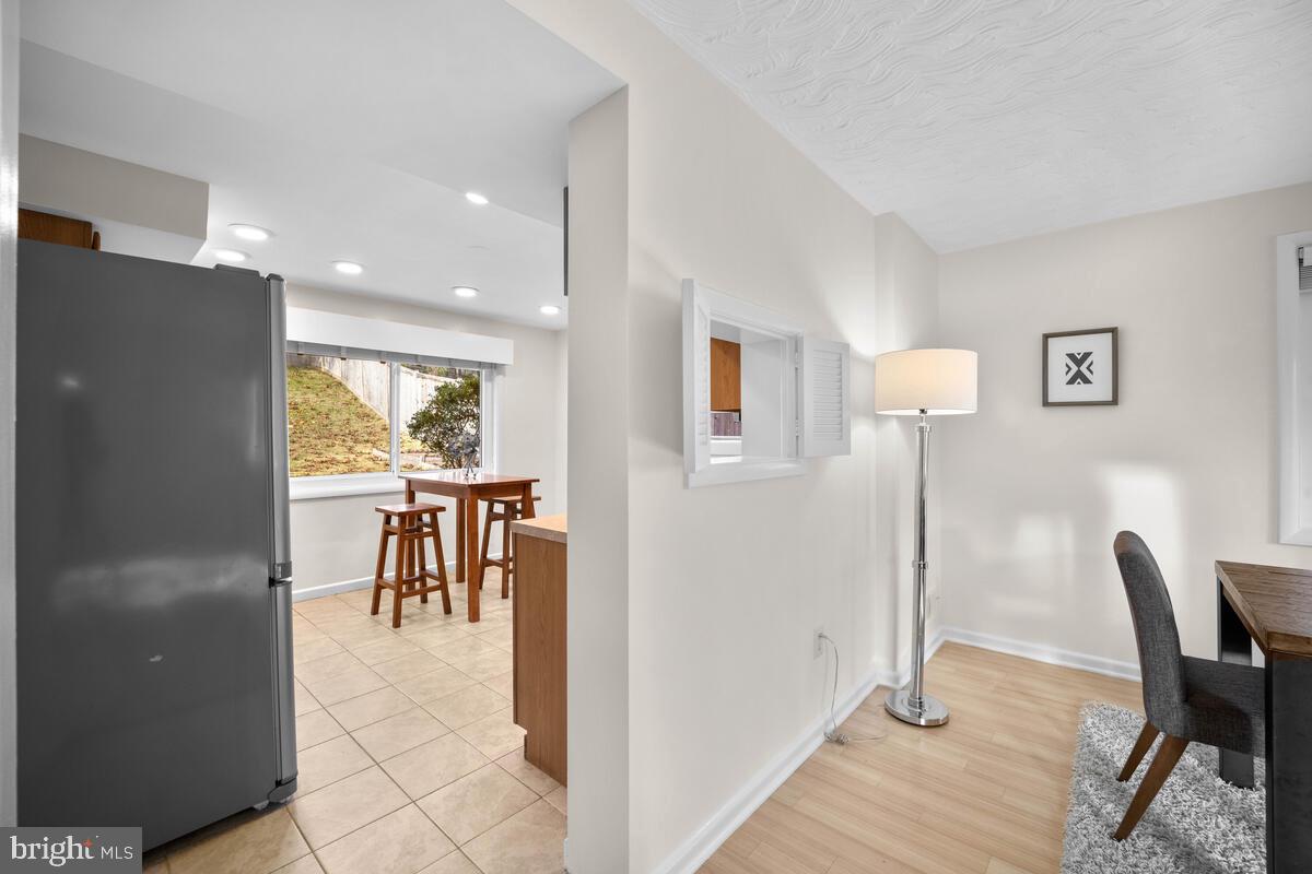 413 Waterford Road Silver Spring, MD 20901 - Photo 19 of 48 a view of a dining room with furniture