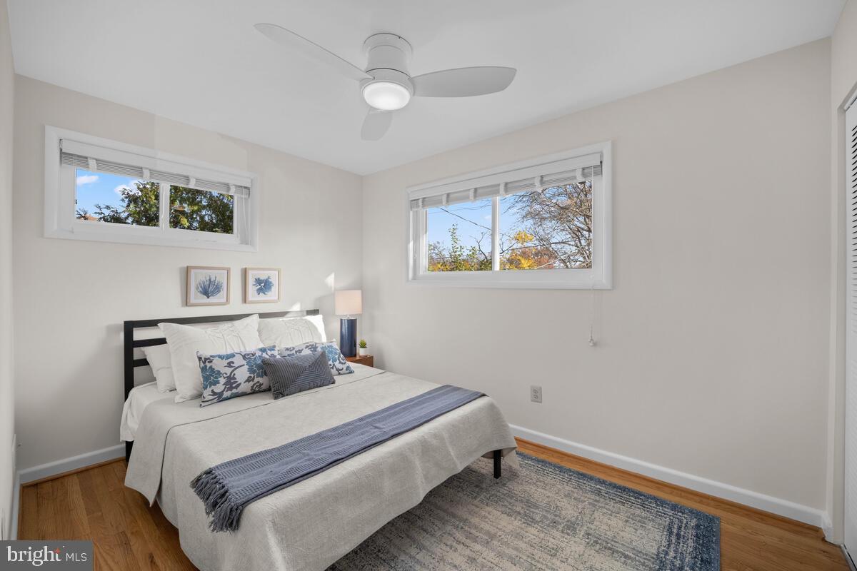 413 Waterford Road Silver Spring, MD 20901 - Photo 26 of 48 a bedroom with a bed and a painting on the wall
