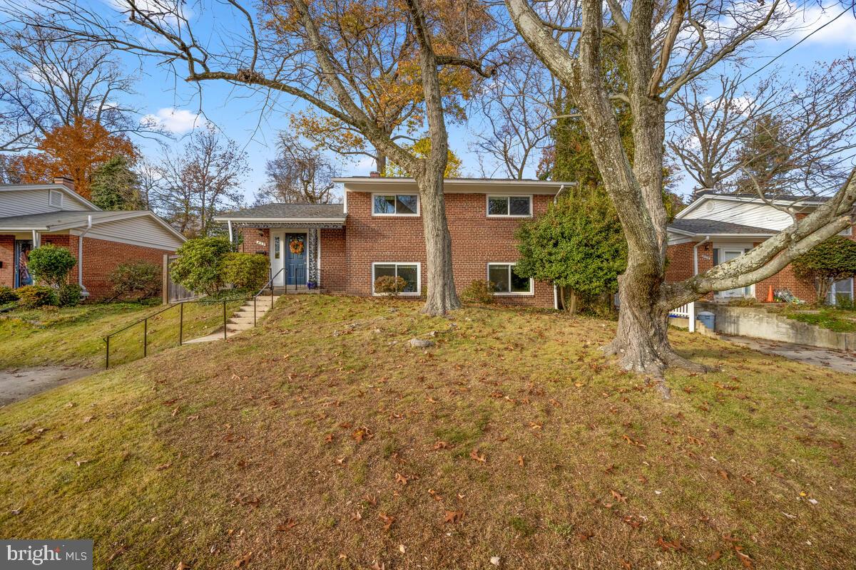 413 Waterford Road Silver Spring, MD 20901 - Photo 43 of 48 front view of a house with a yard