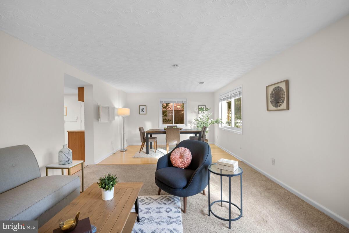 413 Waterford Road Silver Spring, MD 20901 - Photo 8 of 48 a living room with furniture and wooden floor