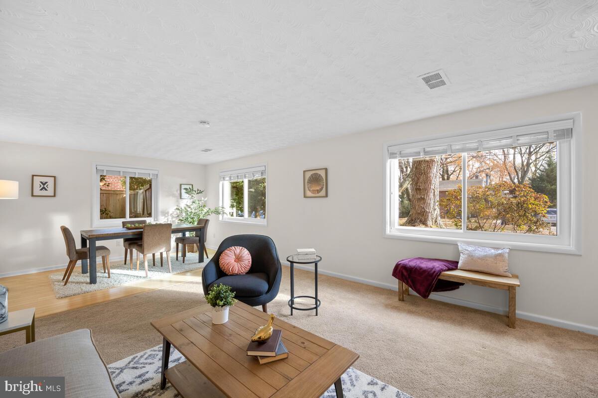 413 Waterford Road Silver Spring, MD 20901 - Photo 9 of 48 a living room with furniture and a window