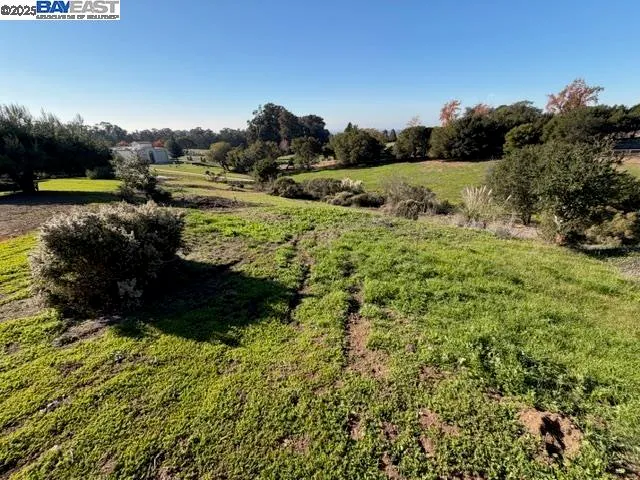a view of a lake with mountain in the background