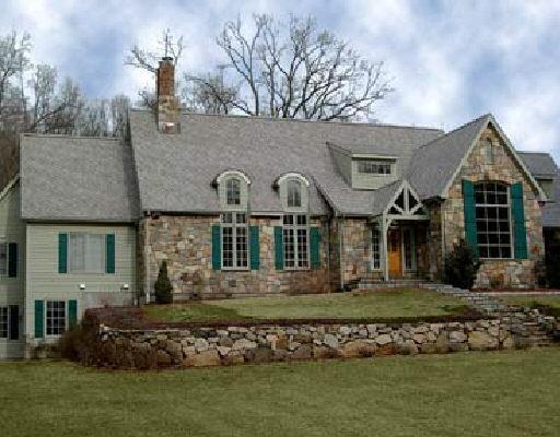 321 Florida Hill Road Ridgefield, CT 06877 - Photo 1 of 1 a front view of a house with a garden