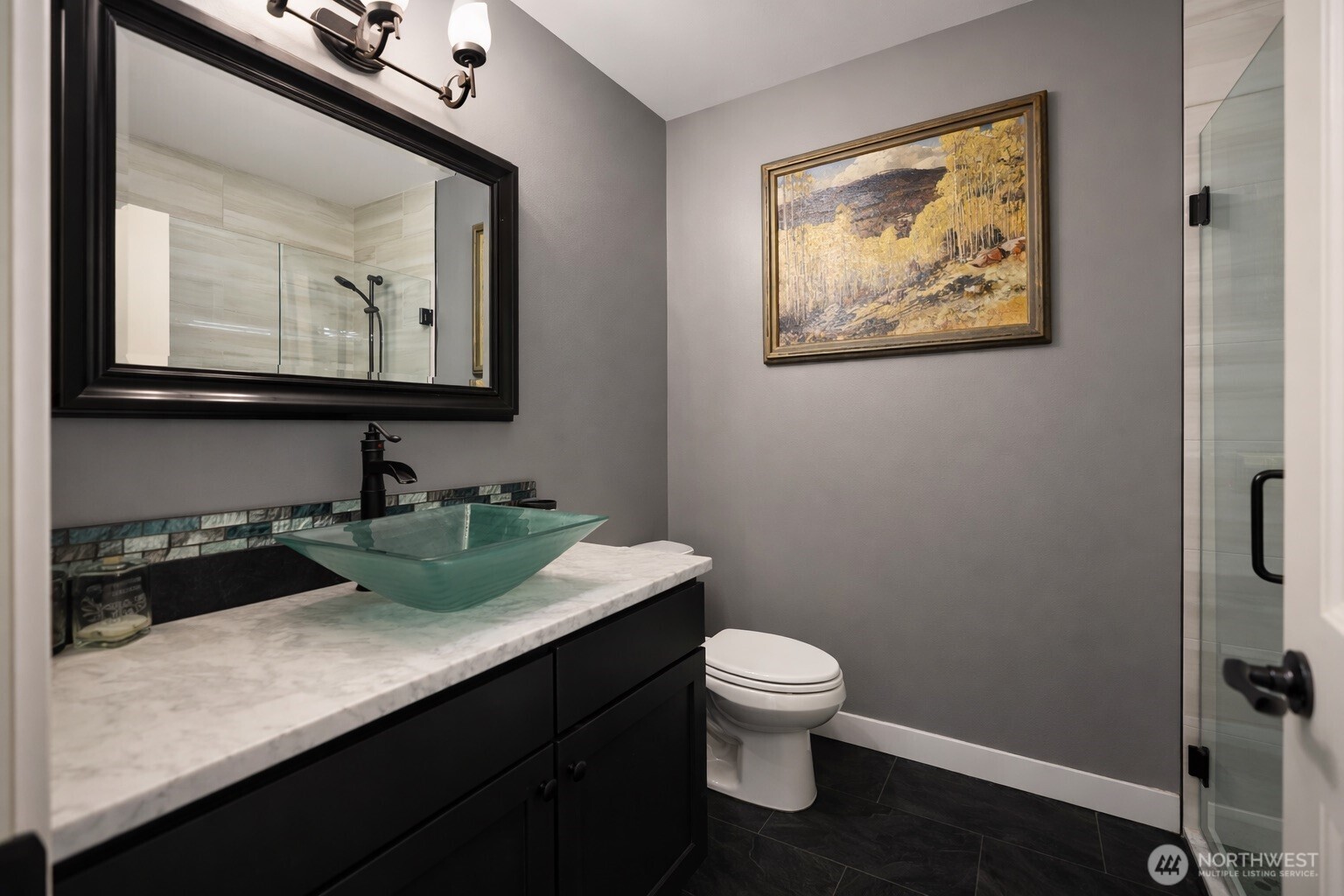 149 Clos Chevalle Road Chelan, WA 98816 - Photo 22 of 37 a bathroom with a toilet sink and mirror