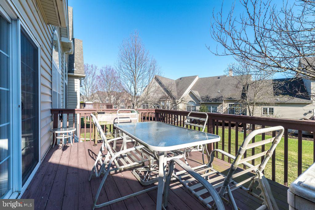 114 West Kennedy Road, Unit 189 North Wales, PA 19454 - Photo 27 of 43 a view of a chairs and table in the patio