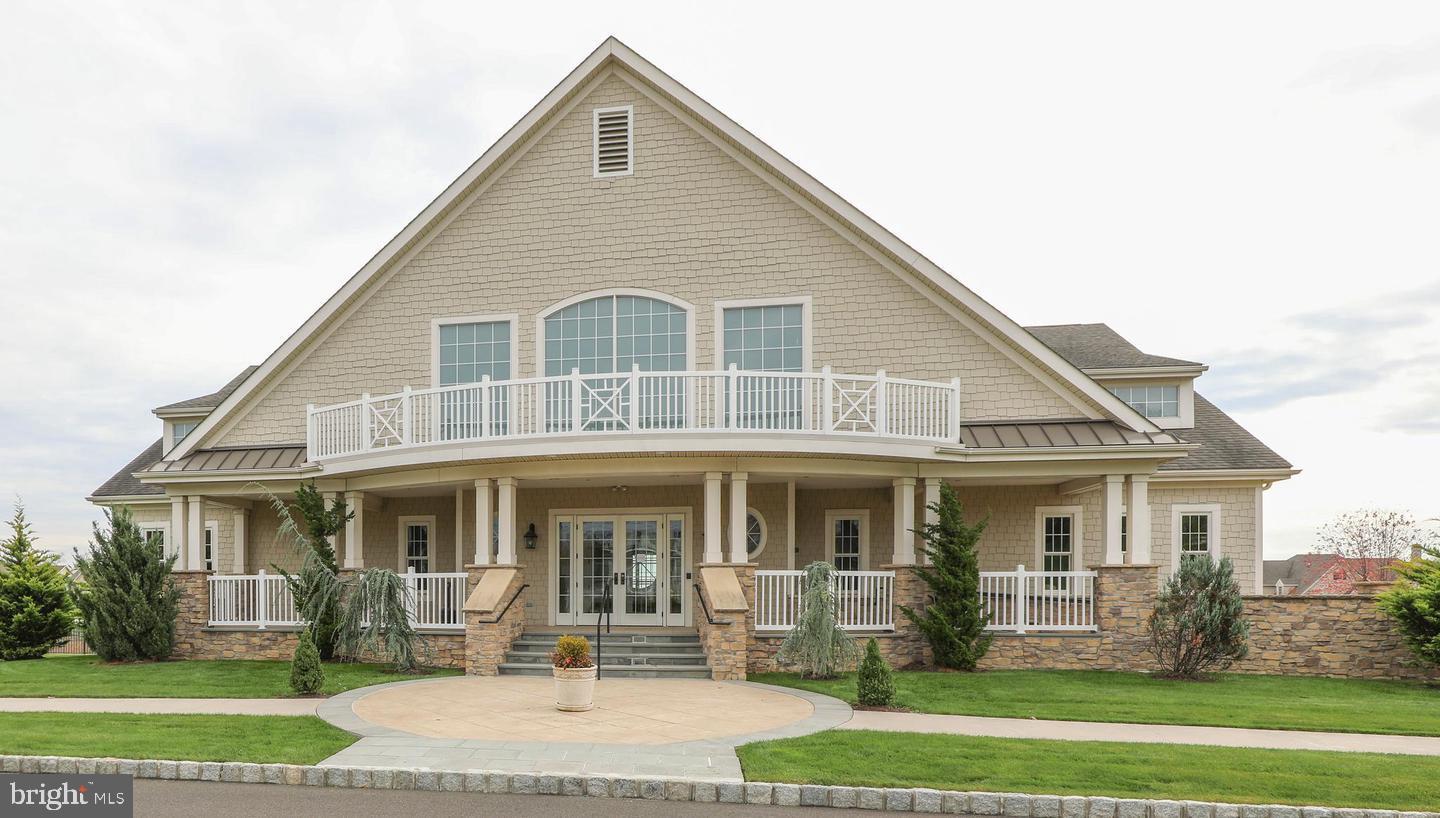 114 West Kennedy Road, Unit 189 North Wales, PA 19454 - Photo 31 of 43 a front view of a house with a yard