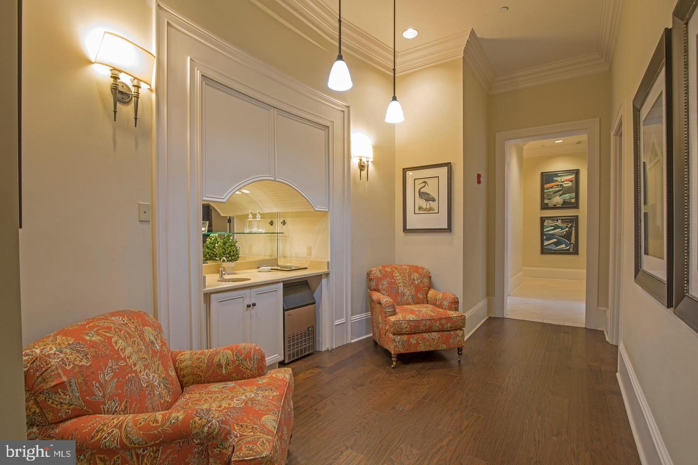 114 West Kennedy Road, Unit 189 North Wales, PA 19454 - Photo 32 of 43 a living room with furniture and a chandelier