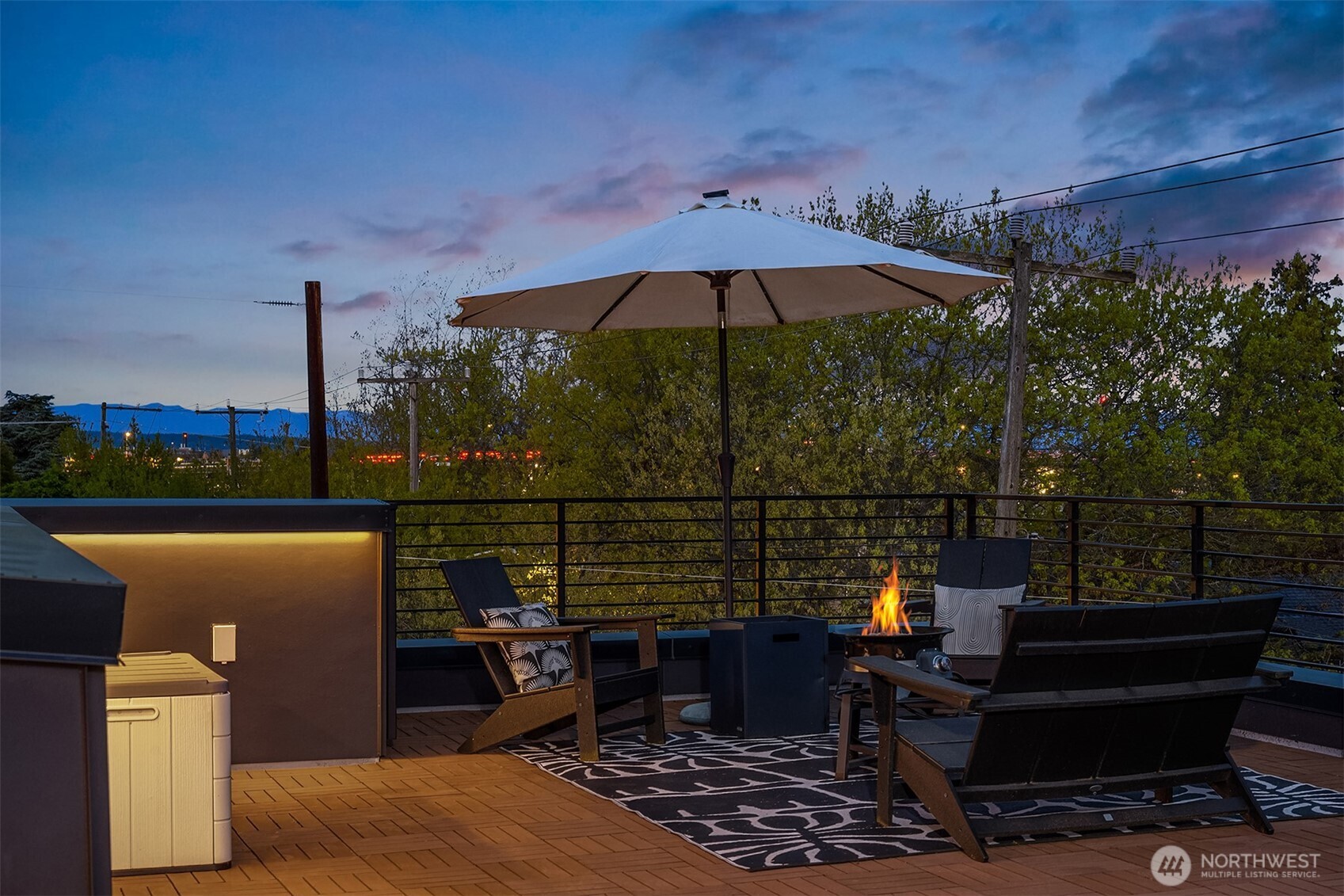 4005 Corliss Avenue North Seattle, WA 98103 - Photo 35 of 40 a view of a terrace with furniture and a yard