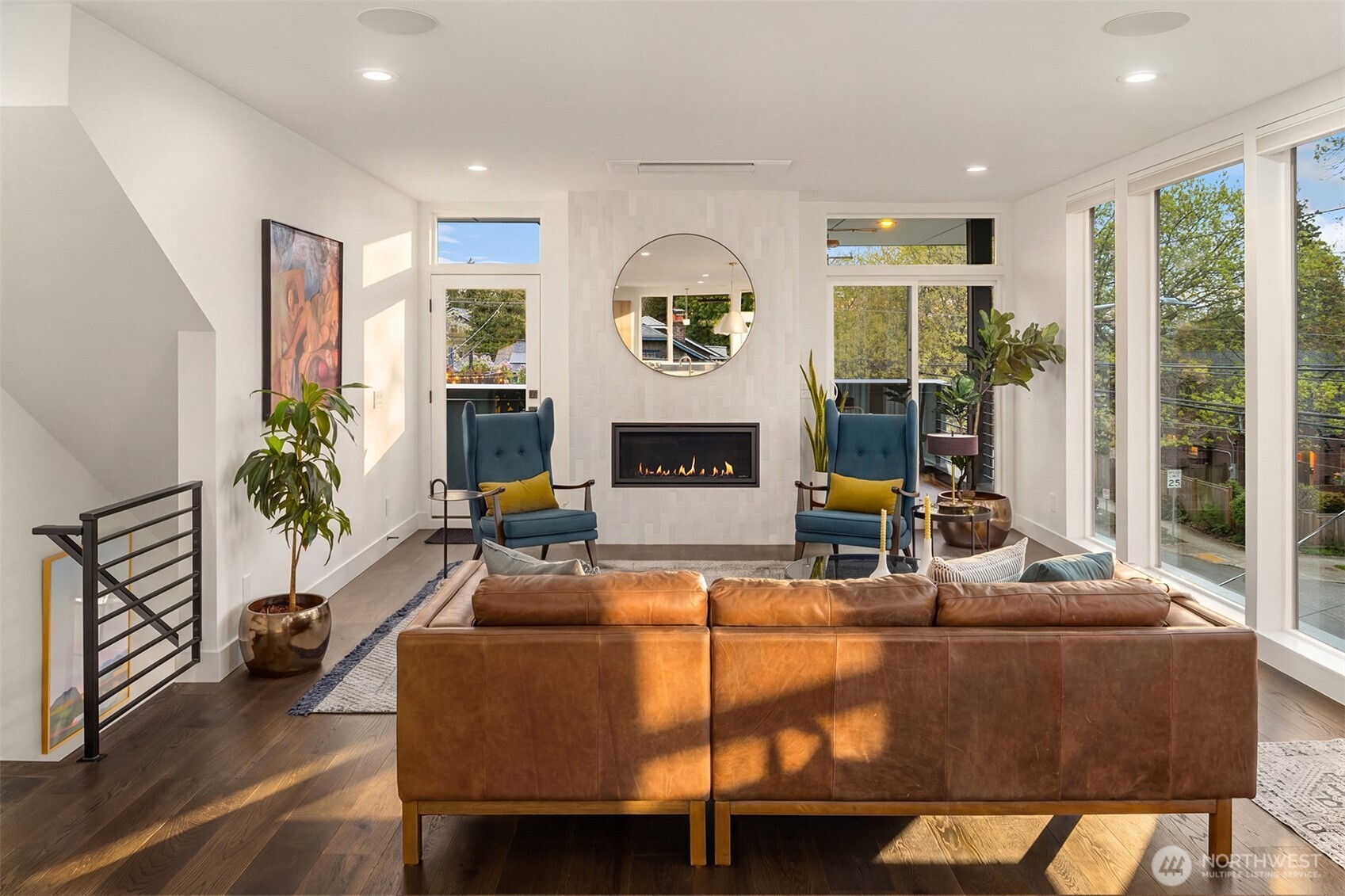 4005 Corliss Avenue North Seattle, WA 98103 - Photo 5 of 40 a living room with furniture fireplace and a large window