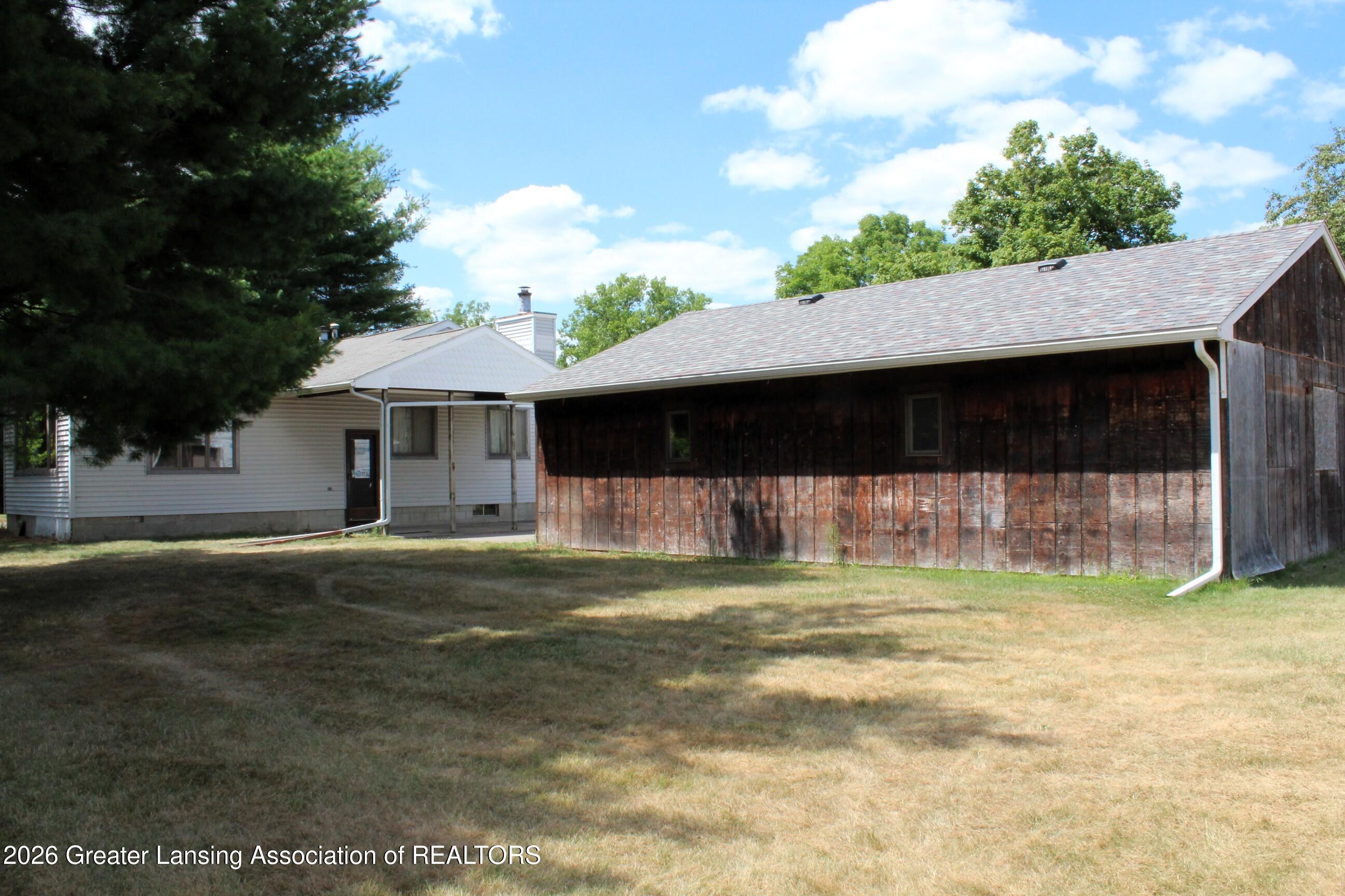 8635 West Herbison Road Eagle, MI 48822 - Photo 36 of 49 Garage-Back View
