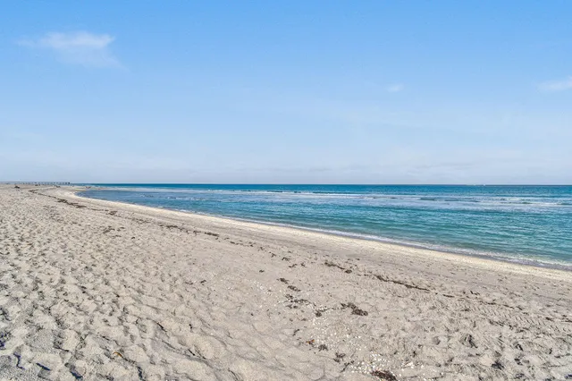 a view of a city with tall buildings in background