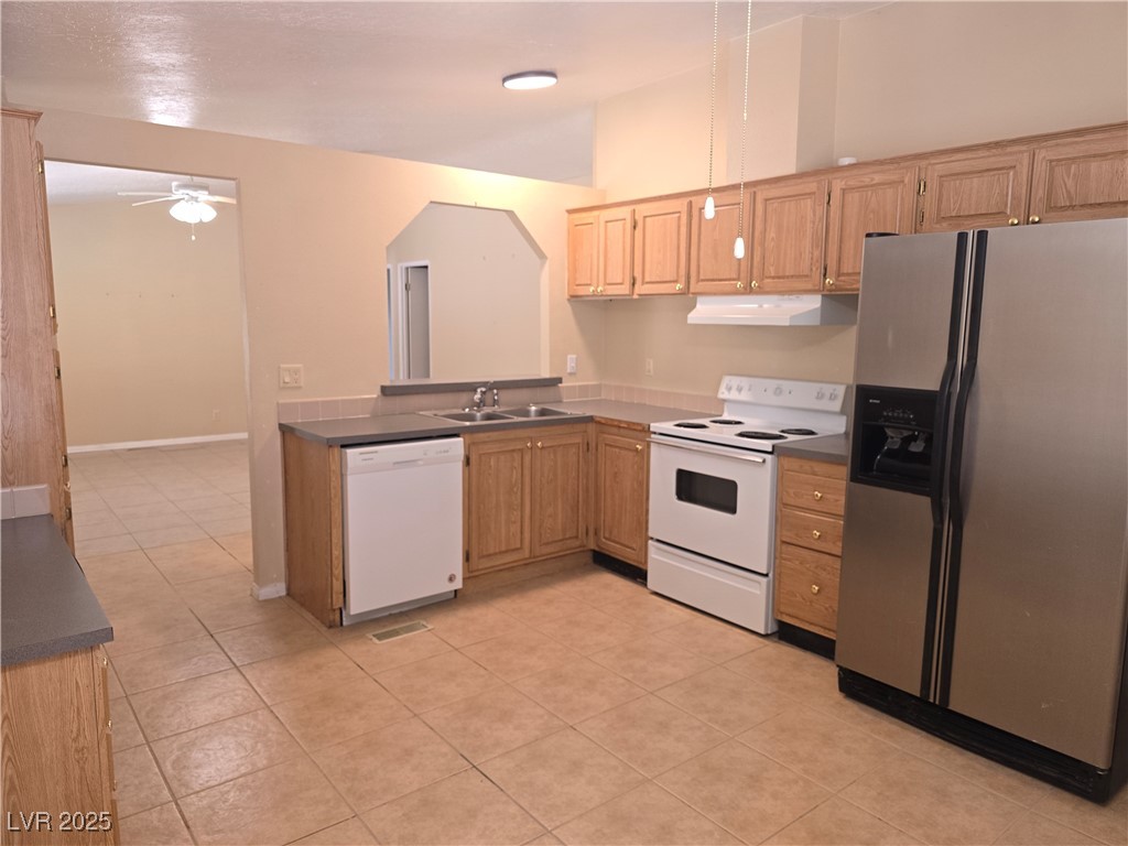 330 Gilmore Road Pahrump, NV 89060 - Photo 17 of 42 Kitchen is in front & opens to the living room.