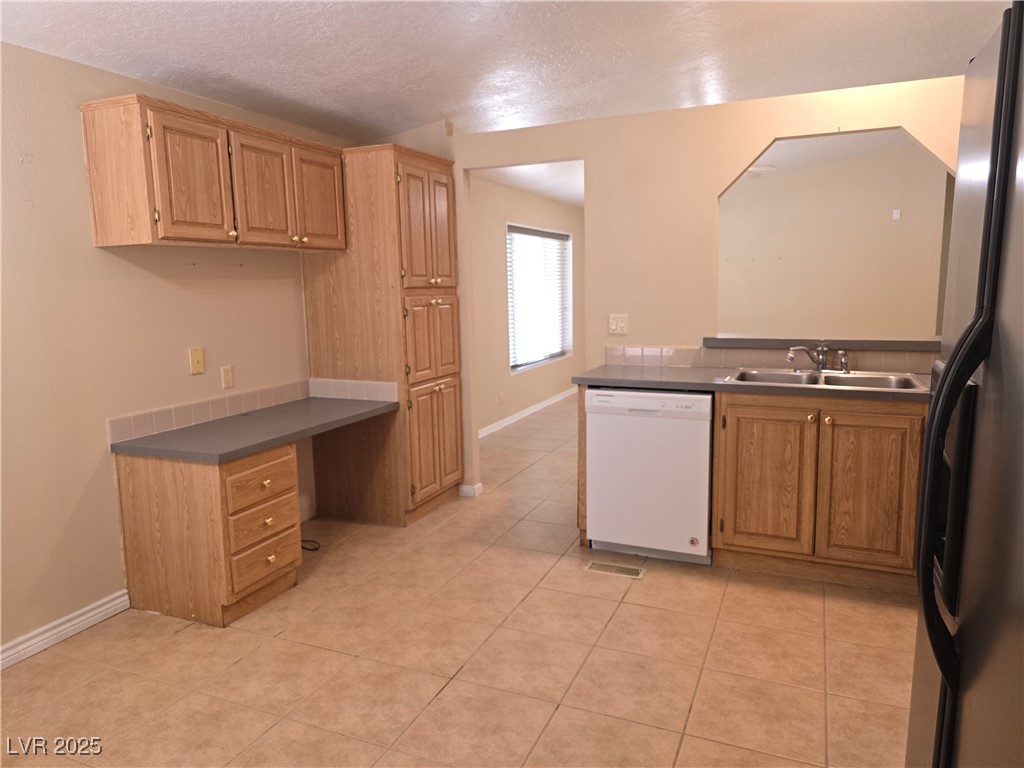 330 Gilmore Road Pahrump, NV 89060 - Photo 18 of 42 Pantry cabinet and desk.