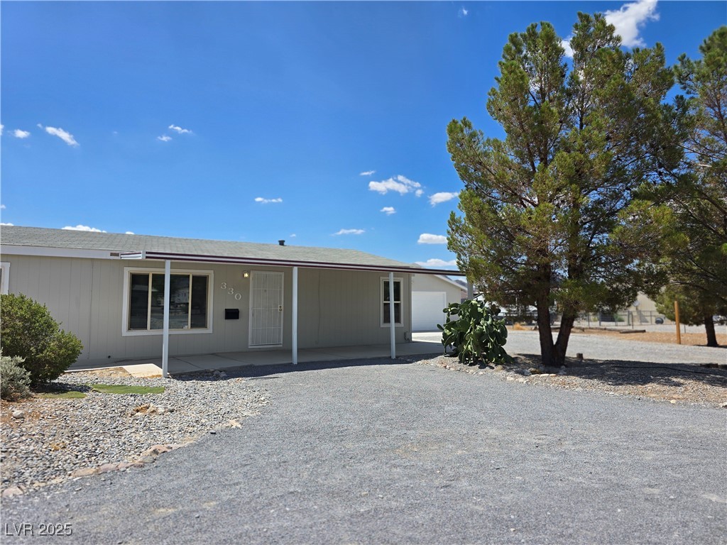 330 Gilmore Road Pahrump, NV 89060 - Photo 3 of 42 Three bedroom home on 1.04 acres.