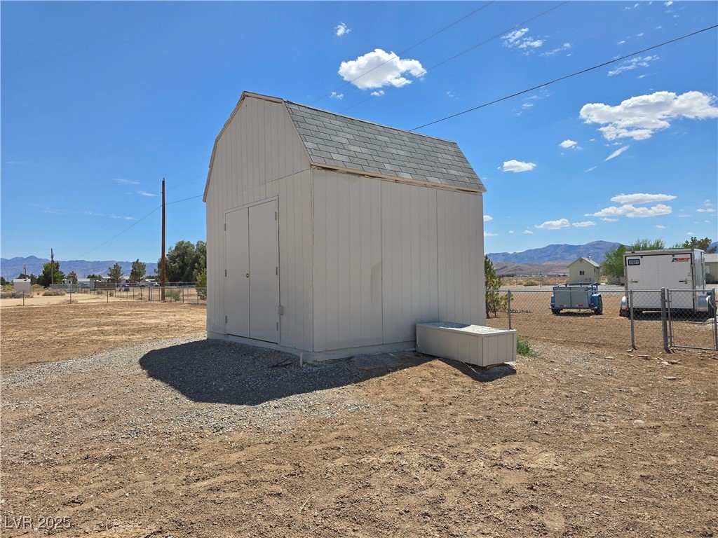 330 Gilmore Road Pahrump, NV 89060 - Photo 31 of 42 Large insulated pump house with cement floor & sto