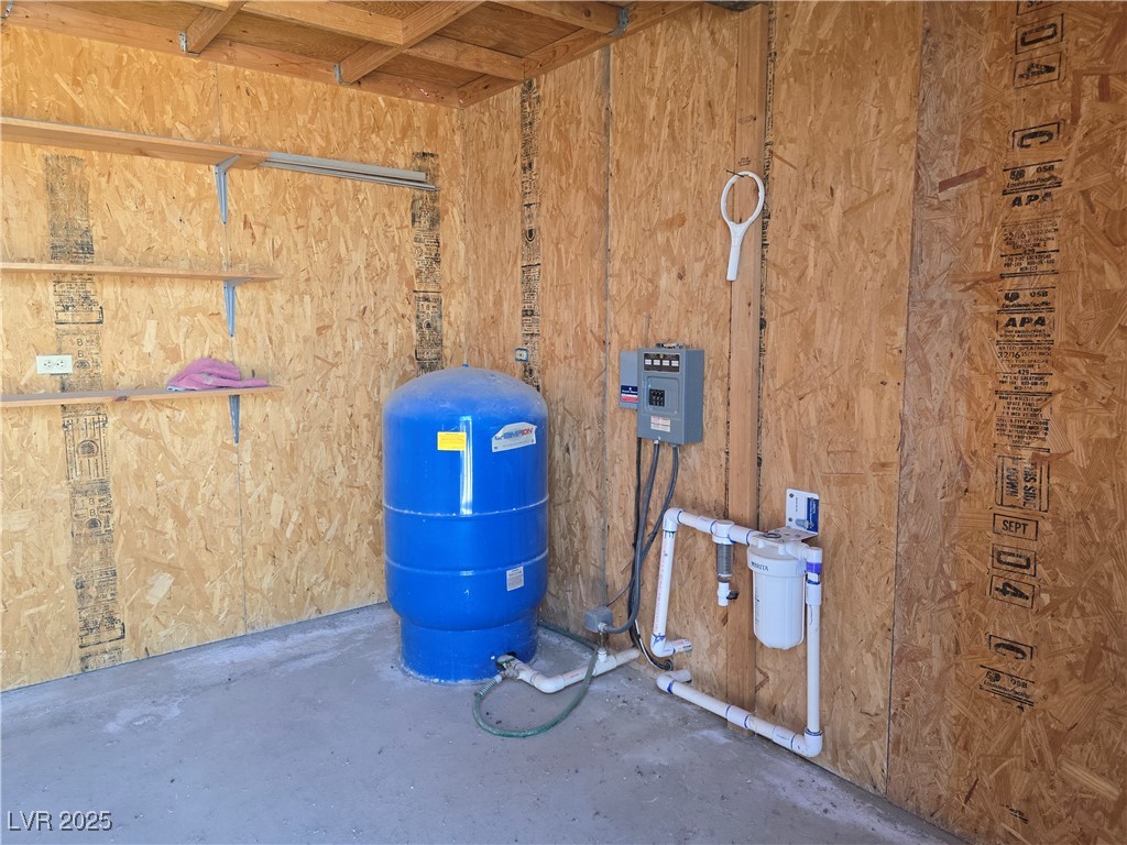 330 Gilmore Road Pahrump, NV 89060 - Photo 32 of 42 Pump house interior with shop light, wall receptac
