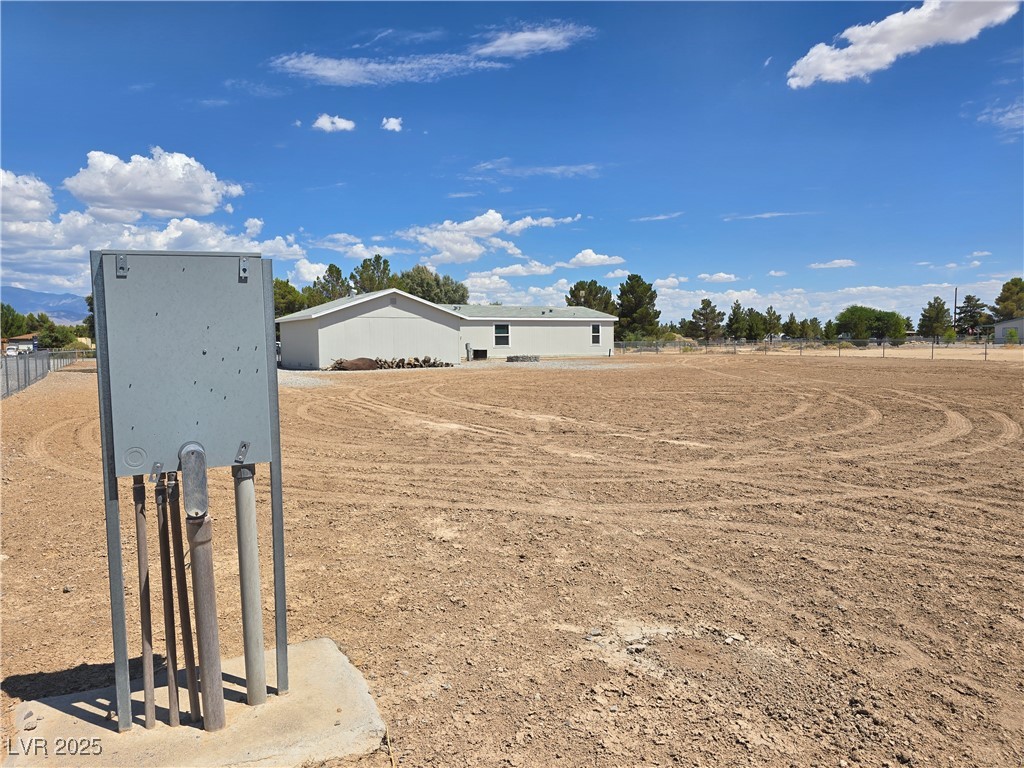 330 Gilmore Road Pahrump, NV 89060 - Photo 34 of 42 Ancillary power pedestal viewed with garage & gara