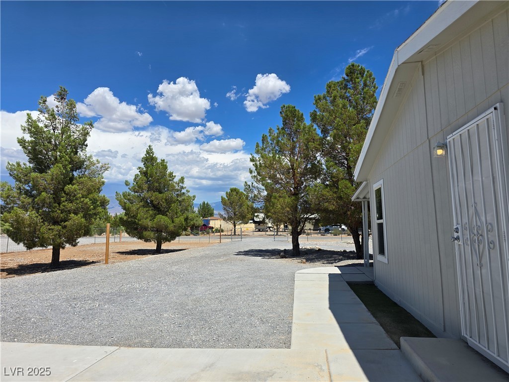330 Gilmore Road Pahrump, NV 89060 - Photo 36 of 42 Long driveway to front gate.