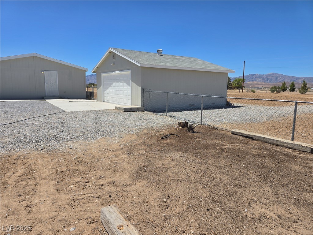 330 Gilmore Road Pahrump, NV 89060 - Photo 38 of 42 Former garden area in foreground.