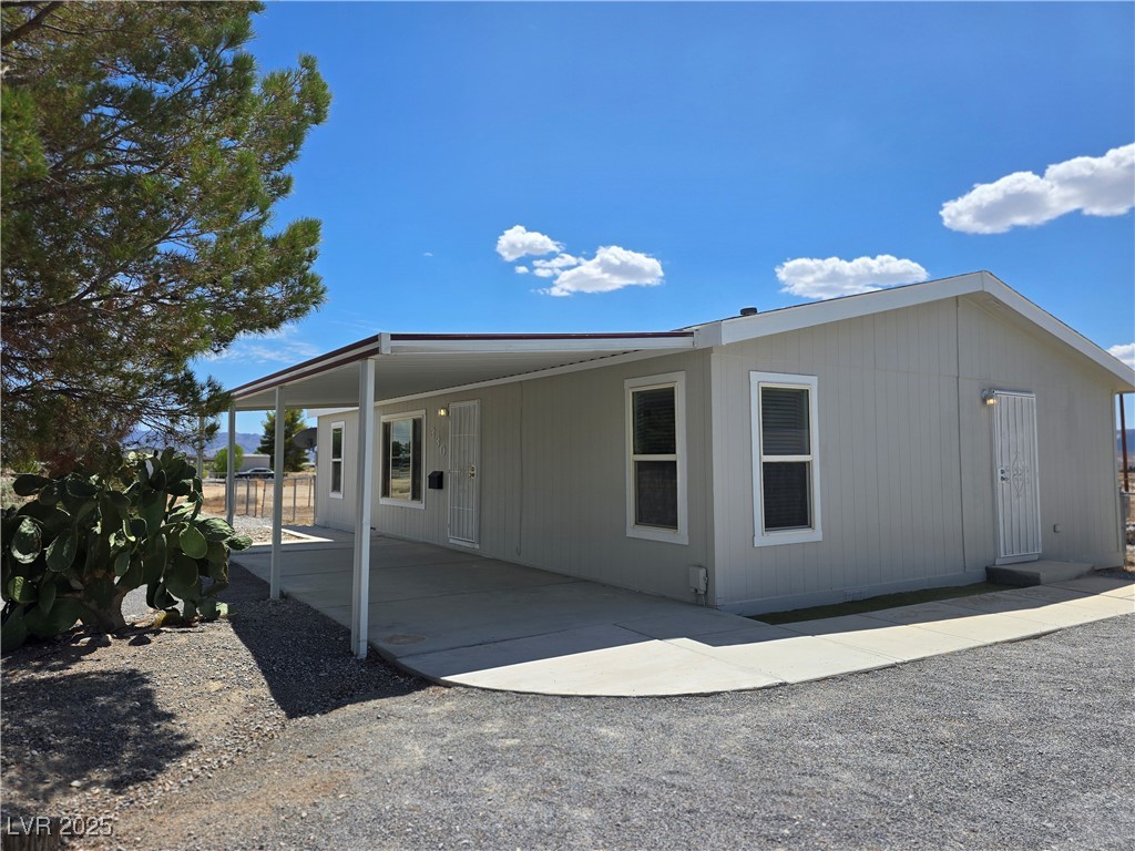 330 Gilmore Road Pahrump, NV 89060 - Photo 4 of 42 Shaded front covered patio.