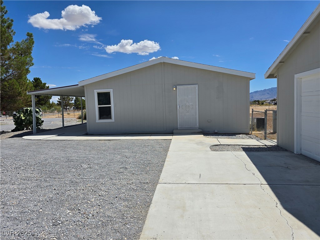 330 Gilmore Road Pahrump, NV 89060 - Photo 8 of 42 Easy access to home through side door.