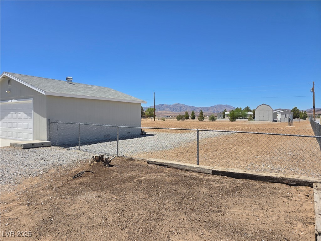 330 Gilmore Road Pahrump, NV 89060 - Photo 9 of 42 View west with pump house at back of 1.04 acre pro