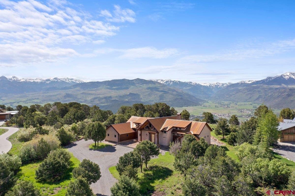 an aerial view of residential house with outdoor space