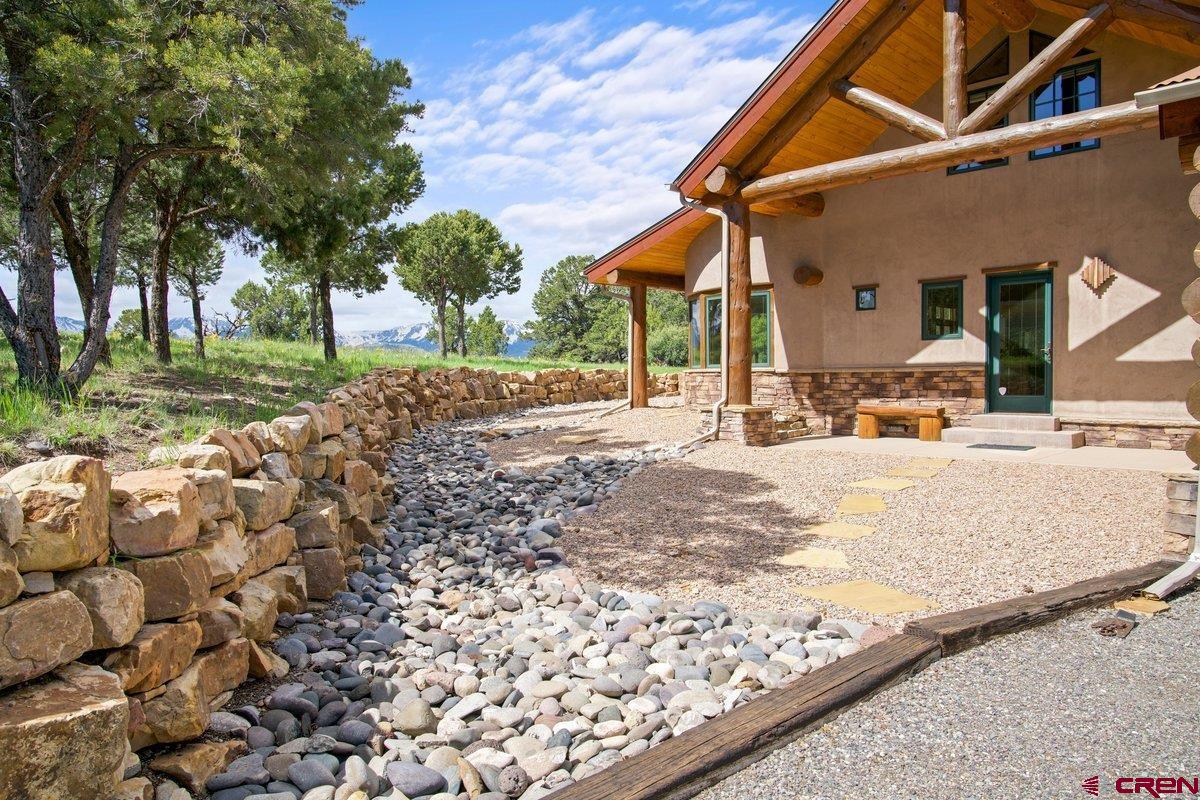 800 Pine Drive Ridgway, CO 81432 - Photo 30 of 35 a view of a backyard with tree s