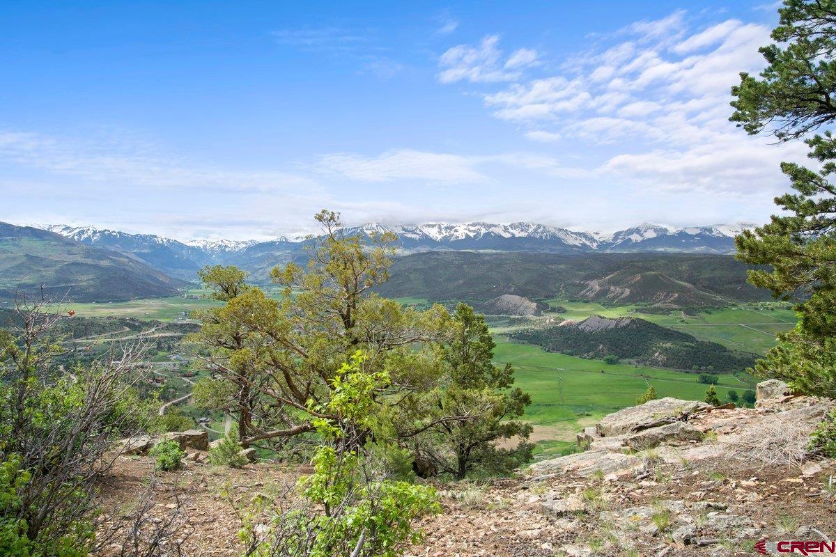 800 Pine Drive Ridgway, CO 81432 - Photo 35 of 35 a view of a lake with a mountain in the background
