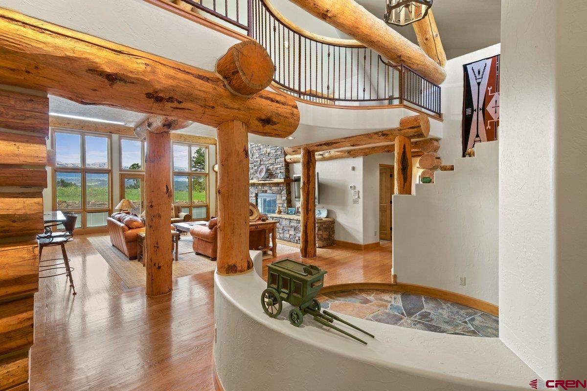 800 Pine Drive Ridgway, CO 81432 - Photo 6 of 35 a dining room with wooden floor and furniture