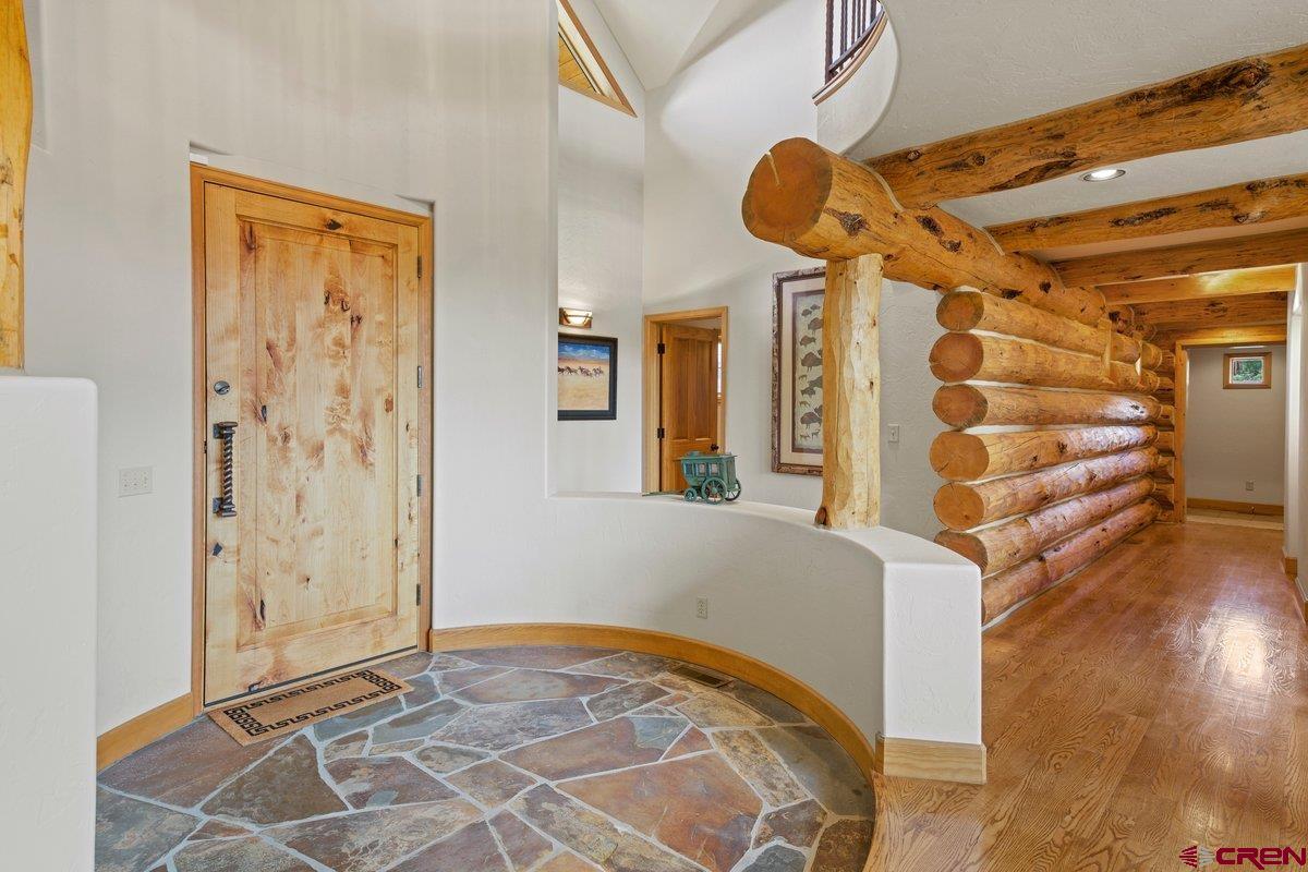 800 Pine Drive Ridgway, CO 81432 - Photo 7 of 35 a view of a livingroom with wooden floor and a bathroom