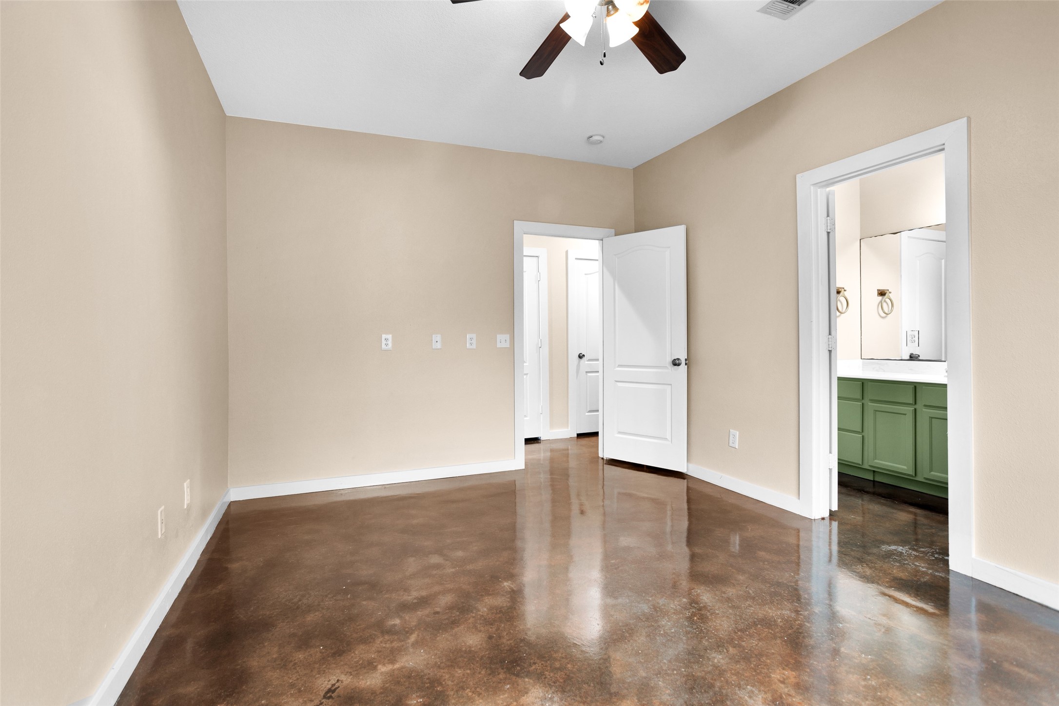 3129 Molly Huntsville, TX 77340 - Photo 17 of 31 an empty room with fan and wooden floor