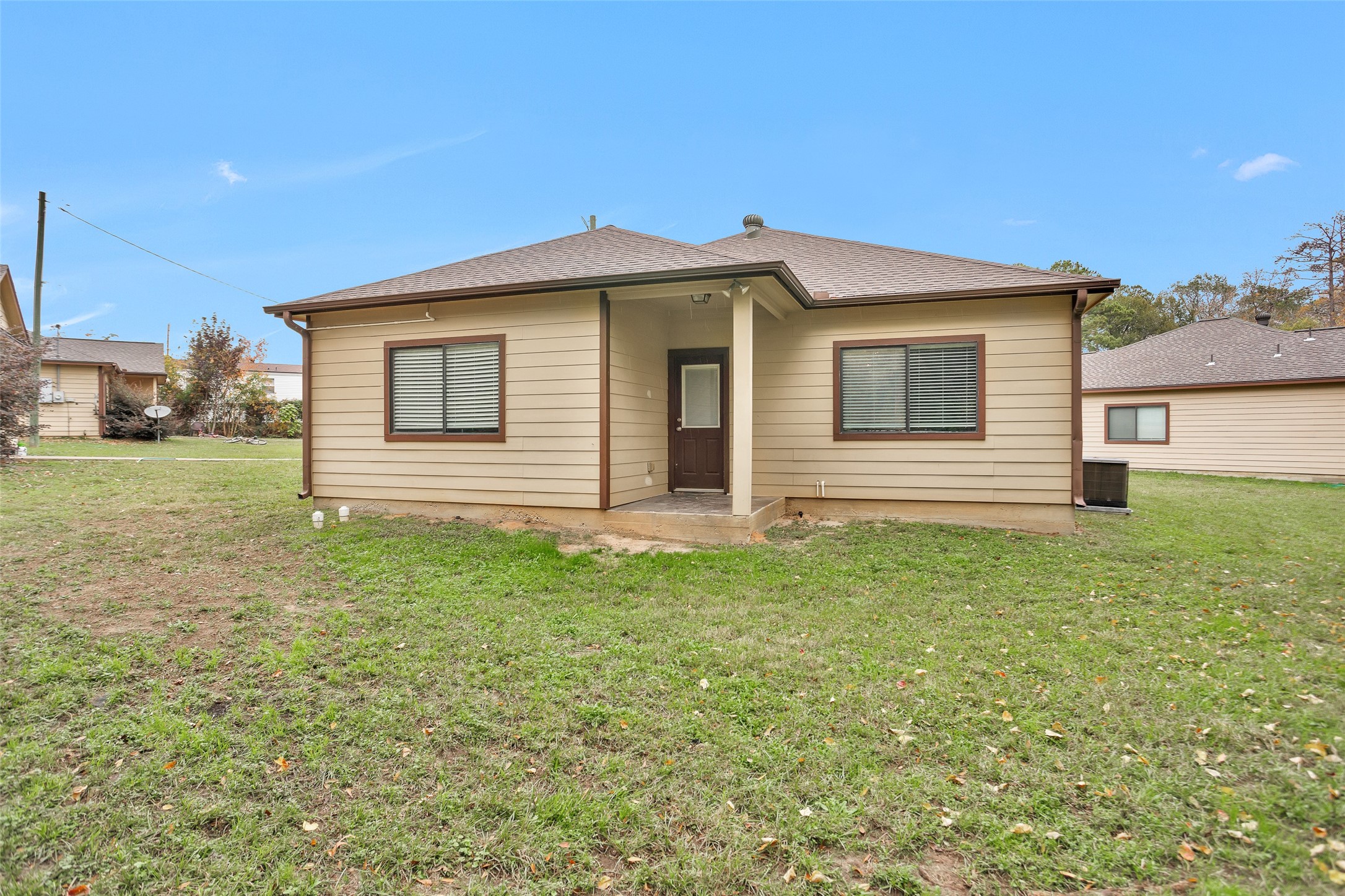 3129 Molly Huntsville, TX 77340 - Photo 30 of 31 a front view of a house with a yard