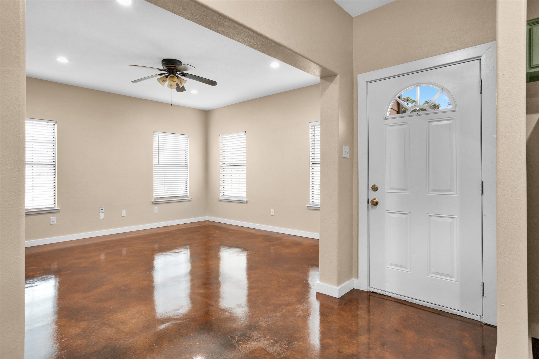 3129 Molly Huntsville, TX 77340 - Photo 6 of 31 a view of an empty room with window and wooden floor