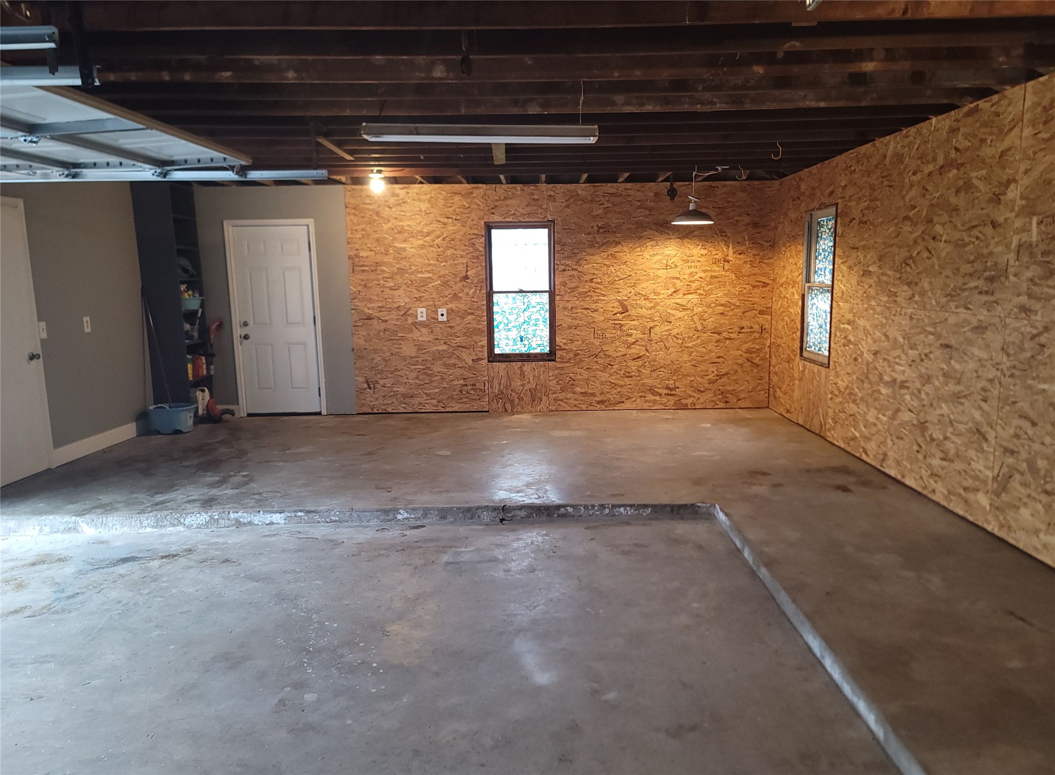628 King Street Houston, TX 77022 - Photo 5 of 24 2 Car Oversized Garage with new walls, has plenty of space for a workbench area and storage!