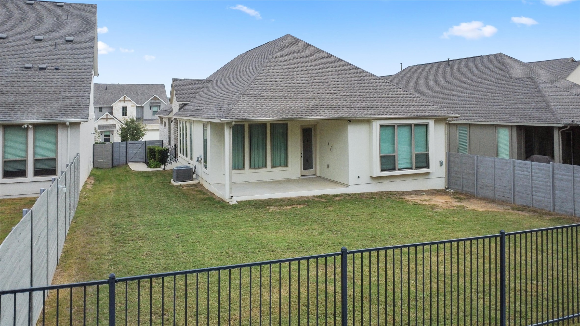 1122 Silver Dollar Trail Georgetown, TX 78628 - Photo 32 of 35 a view of a house with backyard and porch
