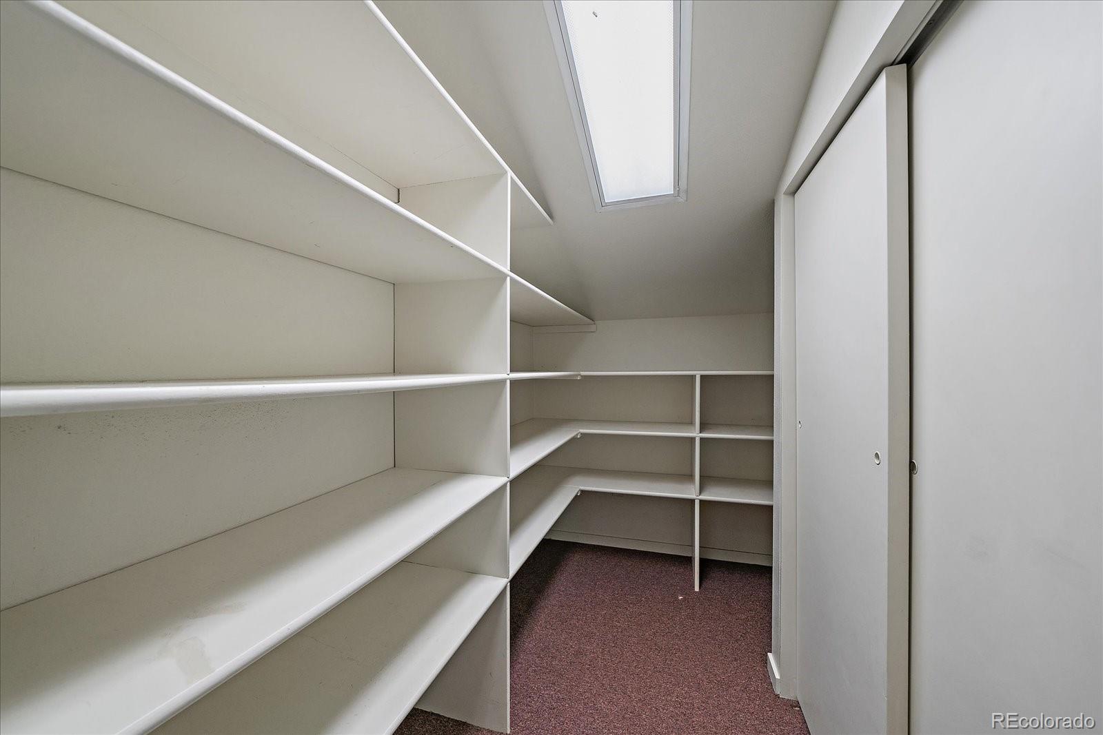 3251 Interlocken Drive Evergreen, CO 80439 - Photo 30 of 43 a view of an empty walk in closet
